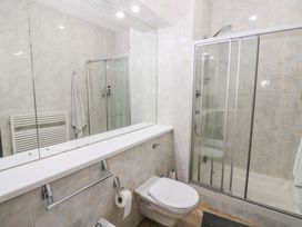 A bathroom with a shower and toilet at Chapel Hill, Catlowdy