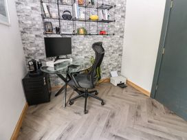 An office with a desk and computer at Chapel Hill in Catlowdy