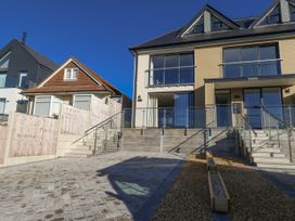 A house with stairs and outdoor area at Seafern House 36B Poole