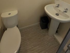 A bathroom with a toilet and sink at Stanbury