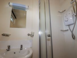 A bathroom with a sink and shower at Stanbury in St Merryn