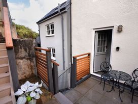 An outdoor area with a table and chairs at proposed 3 bed apartment in Lyme Regis