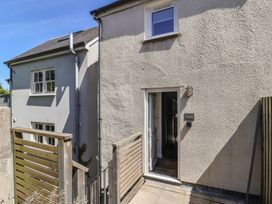 An outdoor entrance with steps and a door at Avocet in Lyme Regis
