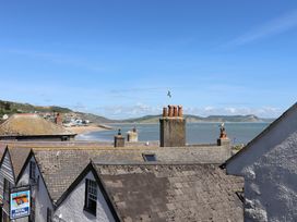 A view of houses and the ocean at Avocet in Lyme Regis