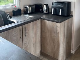 A kitchen with a sink and appliances at 30 Wells Close, Berwick-upon-Tweed