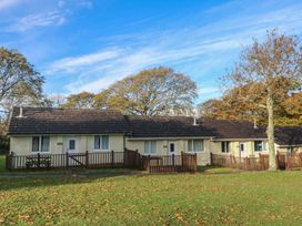 A building with balconies and trees at Little Egret - Number 2