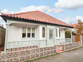 A house with a porch and windows at 52 Lee Road in Aldeburgh