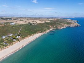 An aerial view of a beach and coastline at The Nook in Praa Sands