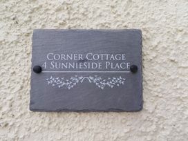 A nameplate for Corner Cottage at 4 Sunnyside Place