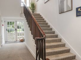 A staircase in a hallway at Derwent in Ulverston