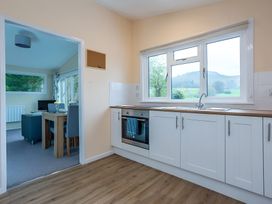 A kitchen with an oven and sink at the property in the countryside