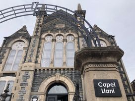 Building facade with sign at Capel Llani in Llanidloes