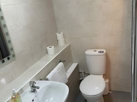 A bathroom with a sink and toilet at Little Russets