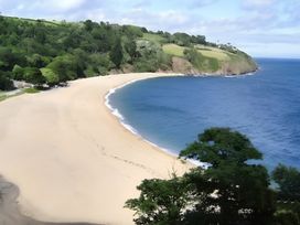 A beach with sand and ocean view at Little Russets in 