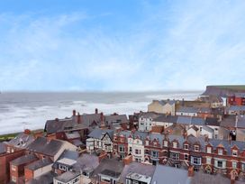 A view of houses and the sea at Victorian Beach House in 