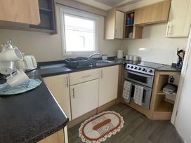 A kitchen with sink and oven at 214 Oaklands Area