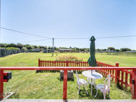 An outdoor area with a table and chairs at St Austell Glamping in St Austell