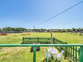 An outdoor area with a table and chairs at St Austell Glamping in St Austell