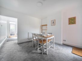 A dining room with a table and chairs at 140 Finchley Road in Ipswich