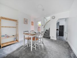 A dining area with a table and chairs at 140 Finchley Road Ipswich