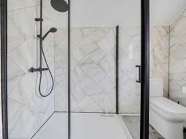 A bathroom with a shower and toilet at 140 Finchley Road in Ipswich