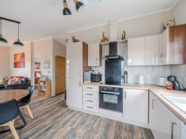 A kitchen with cabinets and appliances at 311 in Bridlington