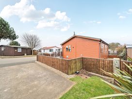 An outdoor view of a house and surrounding area at 311 Bridlington
