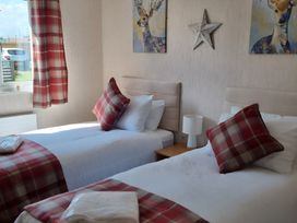 A bedroom with two single beds at 50 Bridlington