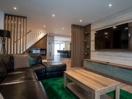 A living room with a sofa and coffee table at The Galloway in Morpeth