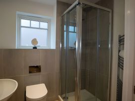 A bathroom with a shower and sink at The Galloway in Morpeth