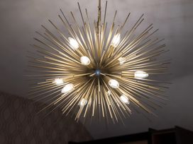 A chandelier with multiple bulbs at The Galloway in Morpeth