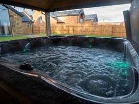 A hot tub with water and jets at The Shearling in Morpeth