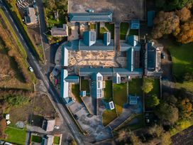 An aerial view of a complex with gardens and buildings at The Shearling in Morpeth