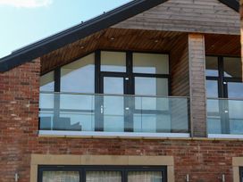 A balcony with windows and a door at The Gavel in Morpeth