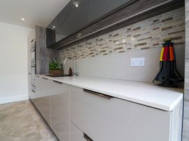 A kitchen with a sink and cabinet at The Gavel in Morpeth