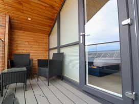 An outdoor space with chairs and a table at The Gavel in Morpeth
