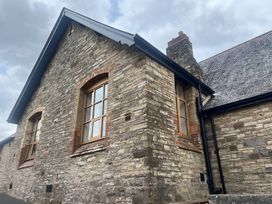 An exterior view of a stone building with windows at 4 Bickington Road Barnstaple