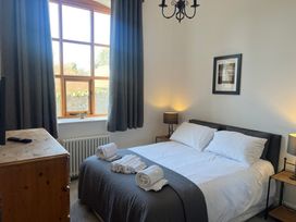 A bedroom with a double bed and chest of drawers at 4 Bickington Road Barnstaple