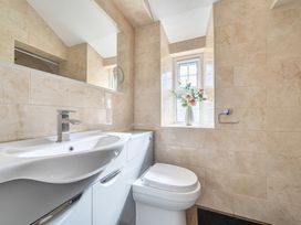 A bathroom with a sink and toilet at Sea View Escape in Penmaenmawr
