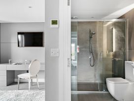 A bathroom with shower and toilet at Huxham View and Annex Stoke Canon