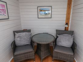 A snug area with two chairs and a table at Sunny Brae in Alnwick