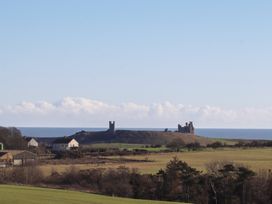A view of castles along the coast at 2 Sunny Brae in Embleton