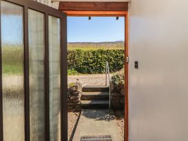 An entrance with a view of the garden at Tullythwaite Barn Kendal