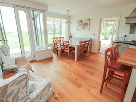 A dining room with a table and chairs at Thimble Hill near Armathwaite