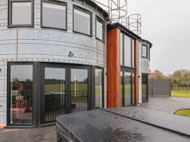 An outdoor view of a property with metal and wooden exterior at Unit 1 in Ipswich