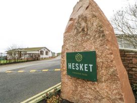 A stone sign for Hesket Caravan Park in Carlisle
