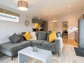 A living room with a sofa and coffee table at The Falls in Leyburn