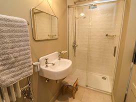 A bathroom with a sink and shower at Fairview in Darsham