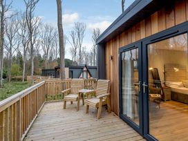 An outdoor area with seating and a view at Tennyson Spa in Louth