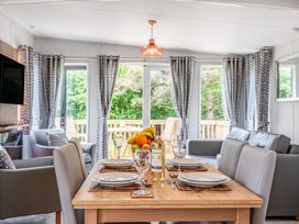 A dining area with a table set for dining at Caistor Spa in Louth